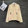 Giacca Chrome Hearts con croci rosa e nere