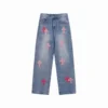 Jeans Chrome Hearts con logo croce rosa