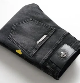 Jeans con logo a croce Chrome Hearts