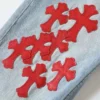 Jeans con toppa rossa Chrome Hearts Jeans con toppa rossa Chrome Hearts