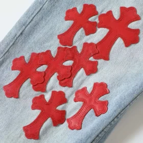 Jeans con toppa rossa Chrome Hearts