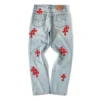 Jeans con toppa rossa Chrome Hearts Jeans con toppa rossa Chrome Hearts