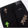 Jeans con toppe in pelle